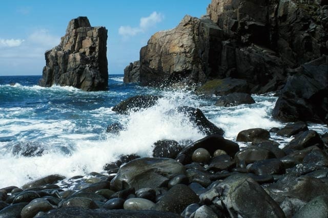 Surf on boulder beach at Harris, Rum