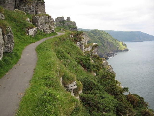 Coast approaching the Valley of the Rocks Castle Rock can be seen beyond the path in the middle distance.