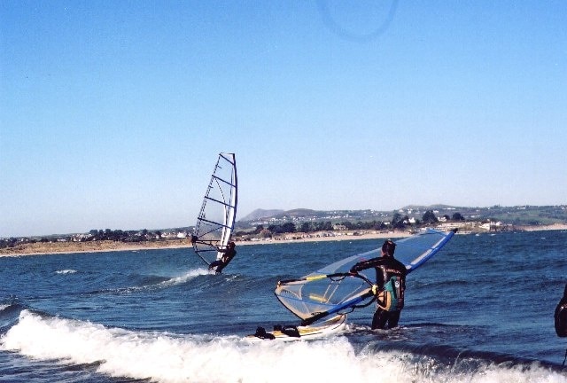 Windsurfers near Penrhyn Du. Taken to the east of Penrhyn Du headland (The wind was NE) Looking NW towards Abersoch Main Beach