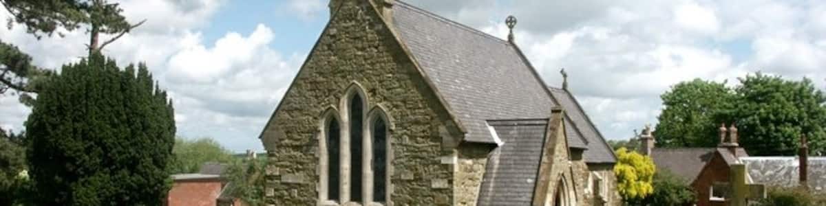 Photo "St Andrew, Fulletby The church was rebuilt in 1705, but its tower fell down in 1799. The church was rebuilt again in 1865 and consecrated on 24th April 1857. Constructed of greenstone, and comprises a nave, chancel and vestry. On the south wall there is a sedilia, one of the few remaining relics of the original church. The font and reredos were decoratively carved by the village blacksmith. The Viking Way passes through the village and there is a footpath running eastwards to Salmonby." by Dave Hitchborne (Creative Commons Attribution-Share Alike 2.0) / Cropped from original