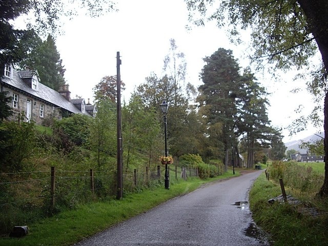 Lamp-posts in Tomich Decorated with flower baskets.