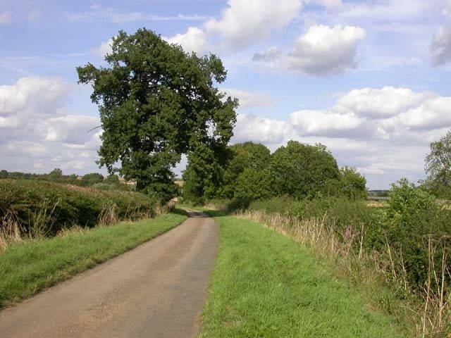 Billede "Church with Chapel Brampton" af Kokai (CC BY-SA) / beskåret fra det originale billede