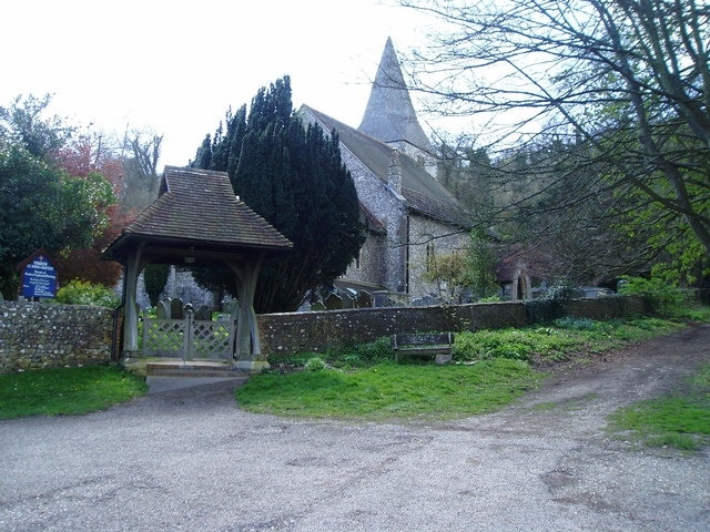 The Monarch's Way passes St John the Baptist Church, Findon Part of the church was built in the eleventh century, since which time arches, fine stained glass windows and a reredos of William Morris tiles have been added.