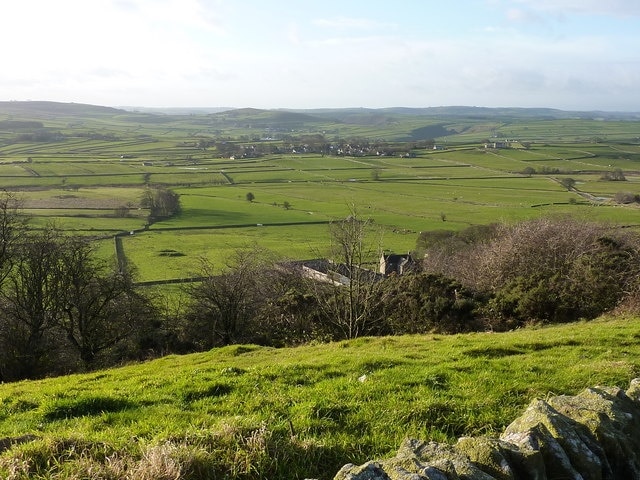 View from Bretton Edge Looking down on Shepherd's Park Farm, with Foolow in the distance