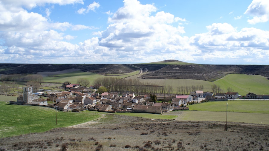 Photo "General view of Dehesa de Cuéllar, a little village in the province of Segovia, Spain." by Rastrojo (Creative Commons Attribution-Share Alike 4.0) / Cropped from original