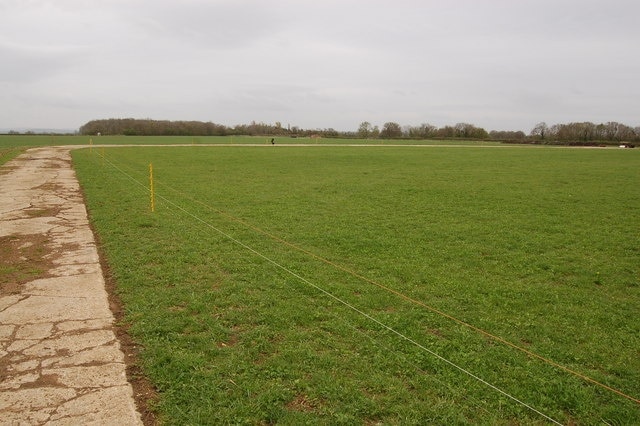 The old concrete perimeter track on the site of RAF Southrop Sheep pasture now but between 1940 and 1947 this was a relief landing ground known as RAF Southrop used by Oxford and Harvard training aircraft. Records indicate that this large flat area east of Cirencester proved an ideal grass landing strip.