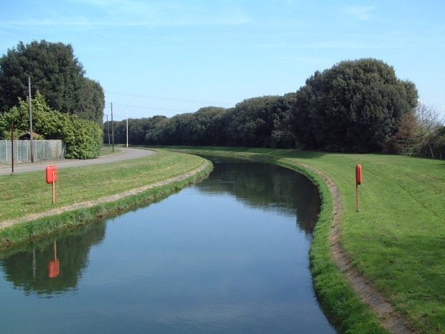 Intake Channel This channel leads from the River Thames to the Queen Mary Reservoir, a distance of about one kilometre. As the reservoir water level is at least 10 metres higher than the river there is a pumping station at the eastern end.