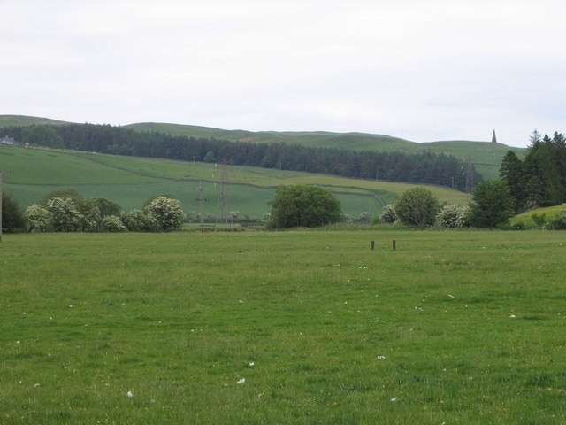 Teviot Valley. Looking north east up the valley from Teviothead church. The monument in the distance is (I think !) to commemorate a local poet, Henry Scott Riddell.