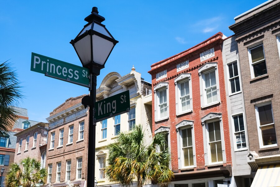 Historic buildings and street signs on King Street in Charleston.