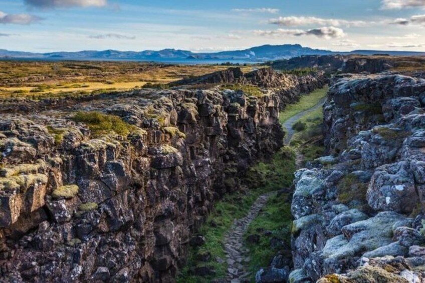 Þingvellir (Thingvellir) is a historic site and national park in Iceland, east of Reykjavík. It's known for the Alþing (Althing), the site of Iceland's parliament from the 10th to 18th centuries.