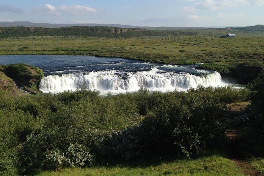 Faxi is a wide, serene waterfall in South Iceland.Faxi falls is approximately twelve kilometres (seven miles) away from Gullfoss and Geysir, two incredibly popular attractions on the Golden Circle.
