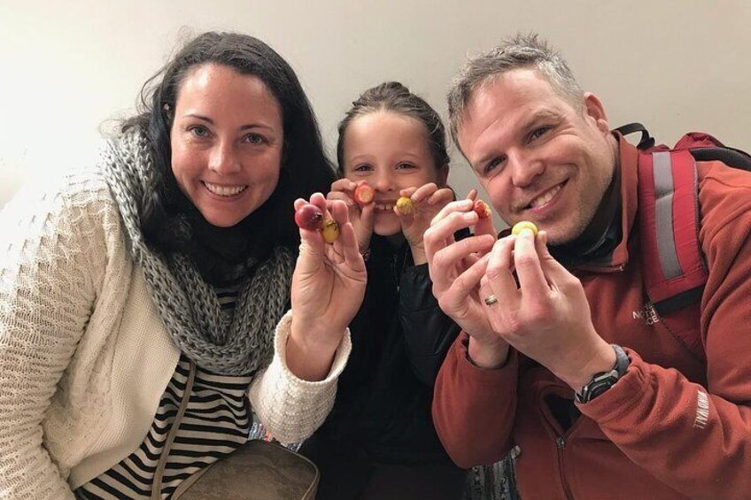 Having fun with some delicious strawberry guava fruits.