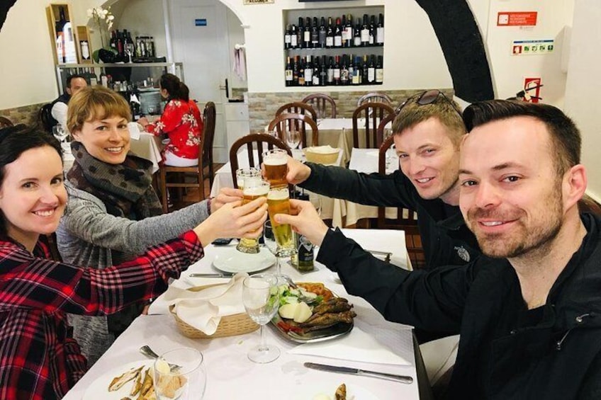 Cheering moments before indulging in some delicious mackerel.