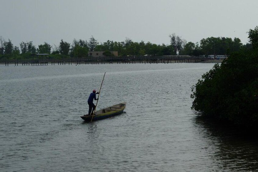 A boatman padding