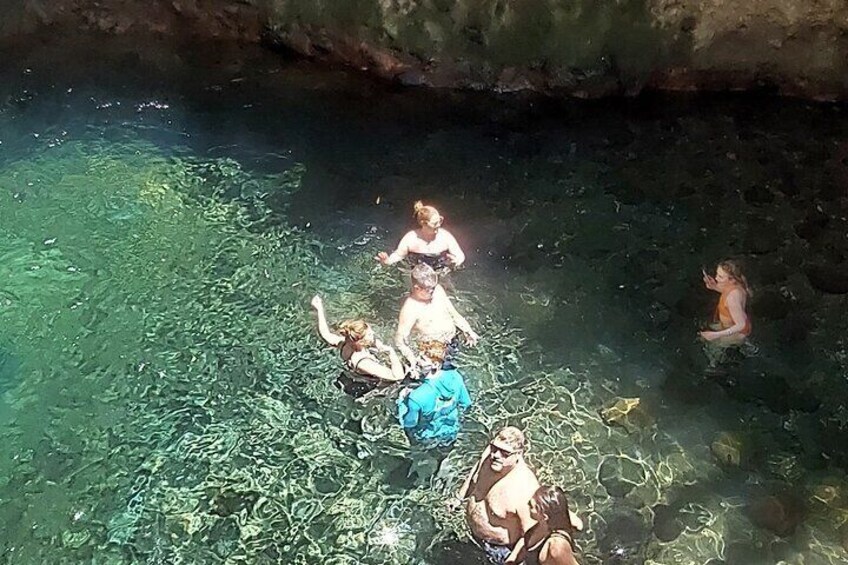 Having fun at the waterfall pool