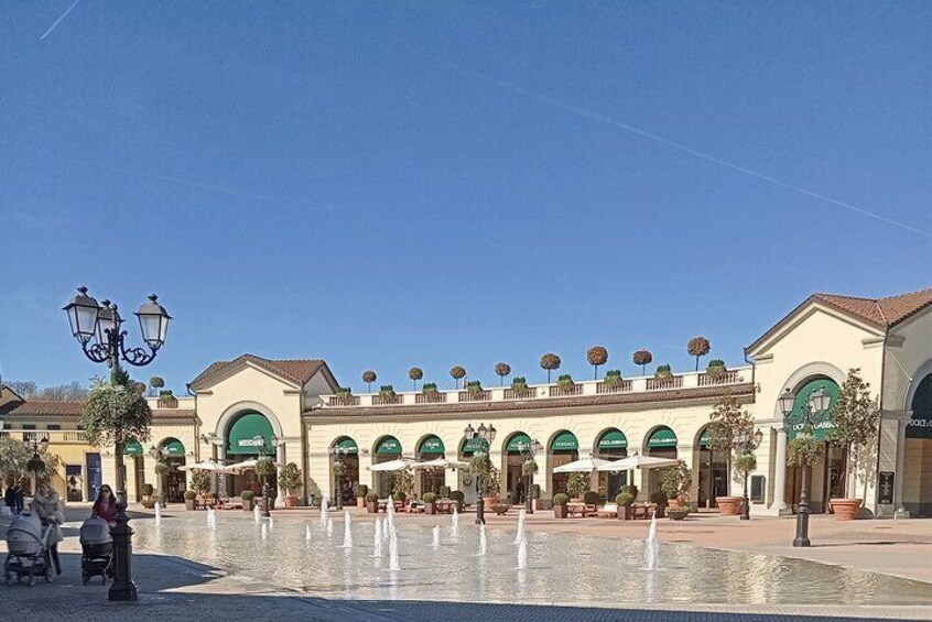 Outlet Serravalle, private car and shopping tour, from Milan.