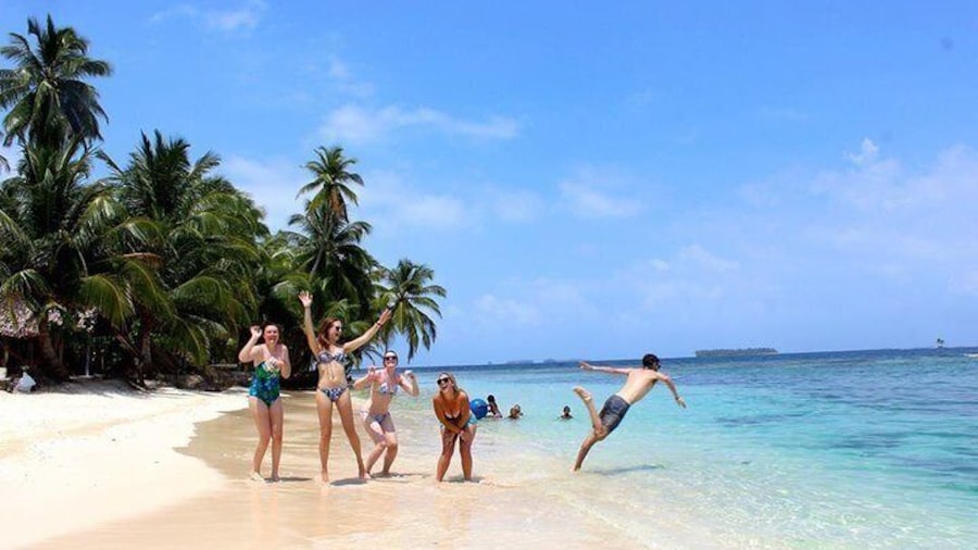 Day Tour guests playing on the beach