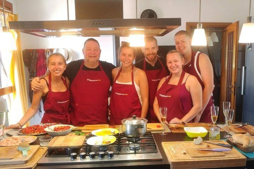 Dad and daughters enjoy the cooking lesson
