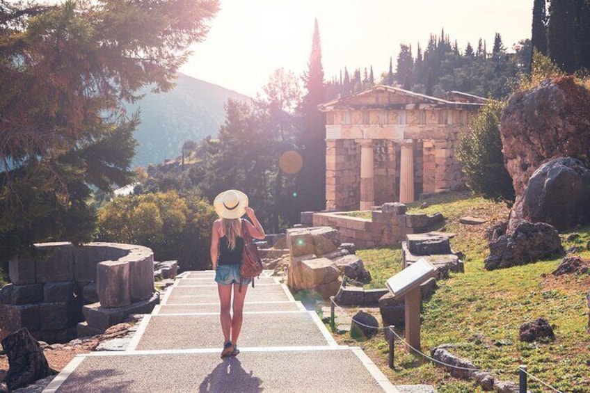 One of our travellers looking at the Temple of Apollo in Delphi archaelogical site