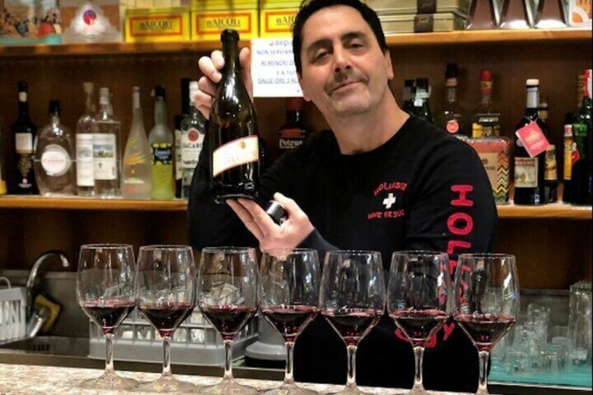 Owner of one of the stops we go to introduces the wine