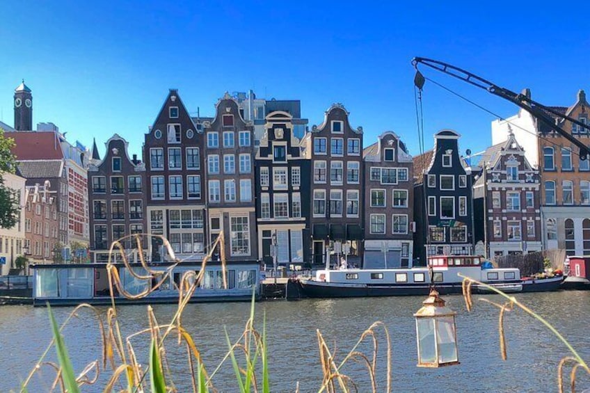 Leaning canal houses on the Amstel river