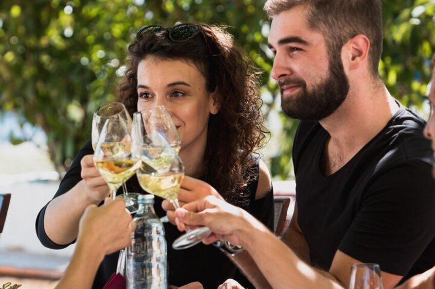 Indulge in wine and snacks during our short stop