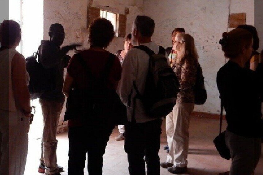 Sogui explaining to his customers in the Slaves House