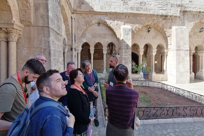 The Church of the Nativity at Bethlehem with the tour guide