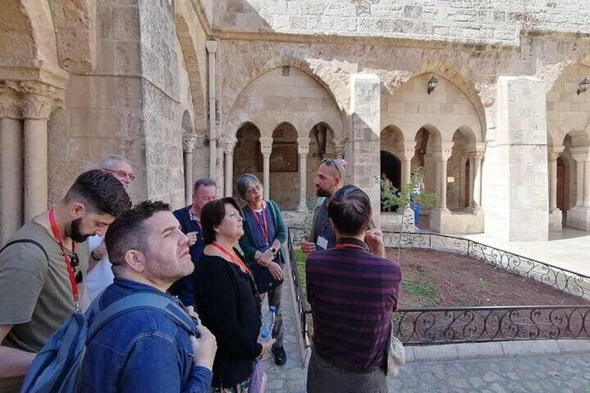 The Church of the Nativity at Bethlehem with the tour guide