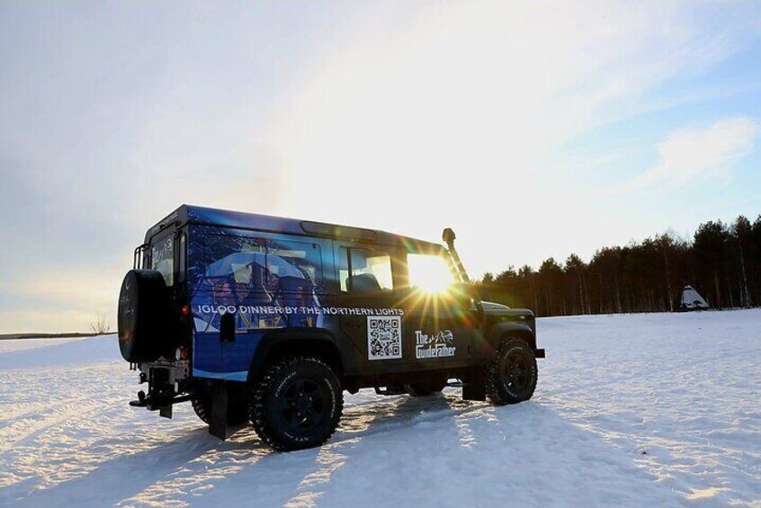 Ice Fishing by Snow scooters with Lunch cooked on fire in Glass Igloo