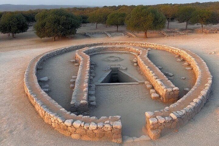 Cagliari: Well Temple and Cabras Museum