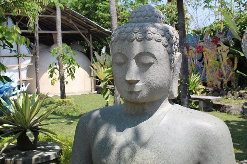 A Buddha statue at a stone carving village 