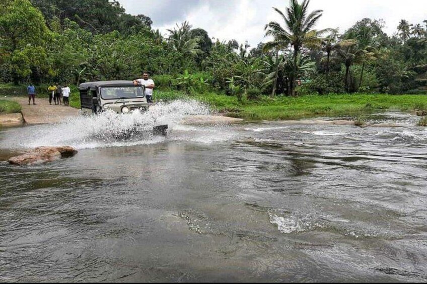 Off Road jeep safari with river crossing in munnar