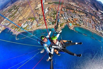 BRONZE paragliding tandem flight above Costa Adeje with free pick up and wa...