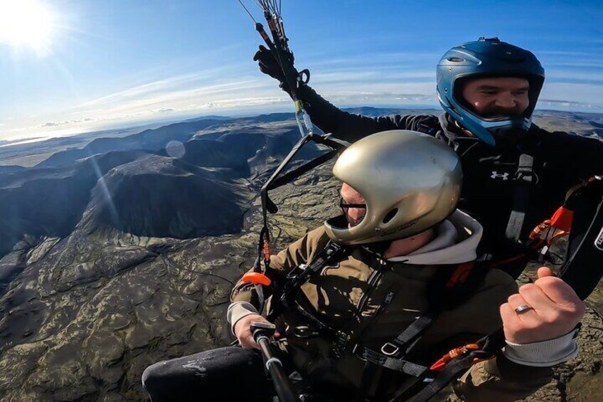 Tandem Paragliding over the Rugged Lava Fields at Blue Mountains