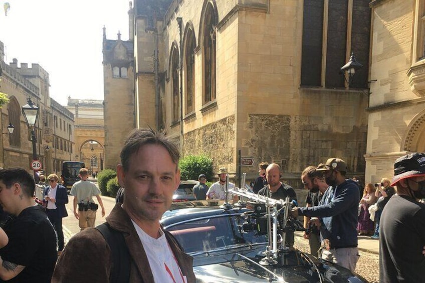 Guide Tom during filming street scene