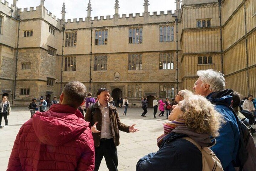 Peter guiding in Bodleian library quad