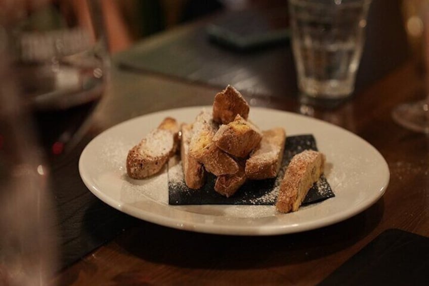 Satisfy your sweet tooth while enjoying your dessert the Tuscan way– with freshly baked biscotti dipped in a delicious “holy wine”