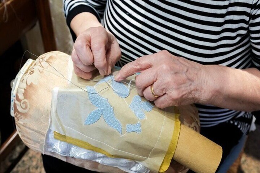 Lacemaking in Burano - Next you'll head to Burano to see an exclusive lacemaking demonstration that the public can't watch
