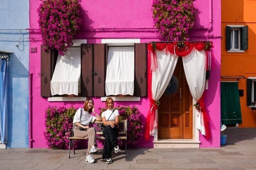 Instagram-worthy photos in Burano - The colorful homes in Burano are world famous, so find a house that matches your outfit and grab those pics!