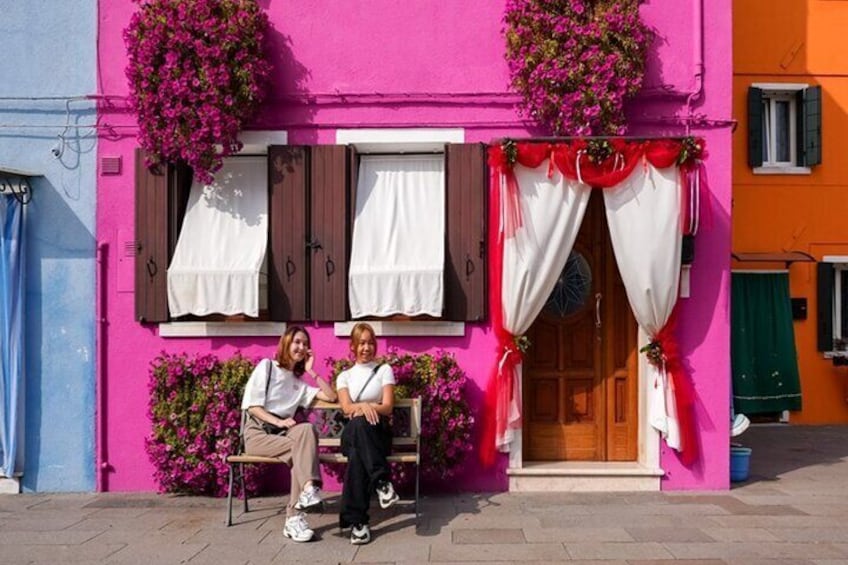Instagram-worthy photos in Burano - The colorful homes in Burano are world famous, so find a house that matches your outfit and grab those pics!