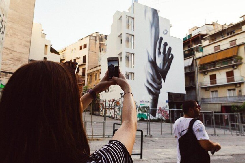 Discover beautiful street art spots in Athens during this private tour with a local