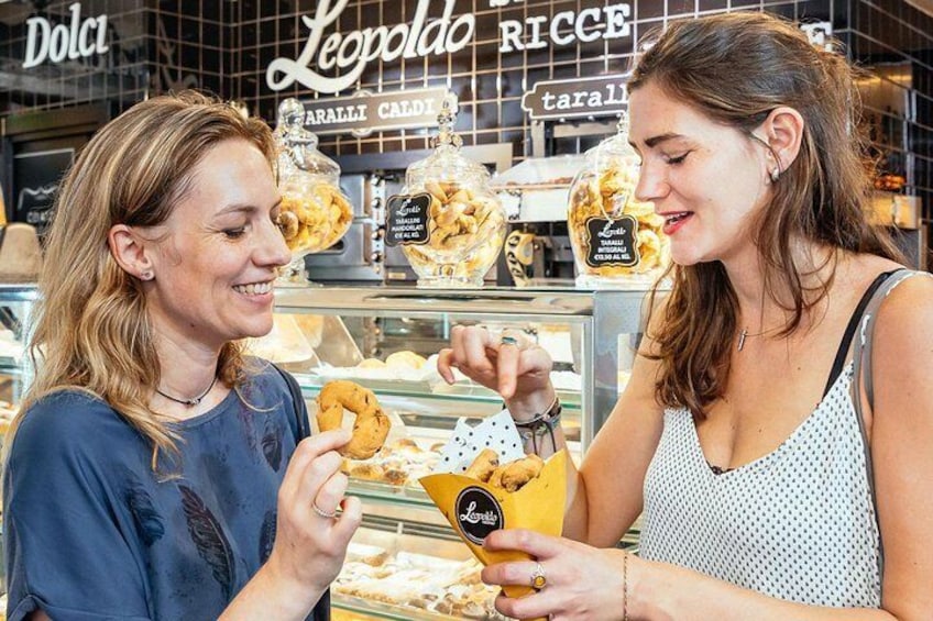 Try a typical savory biscuit during the private food tour of Naples