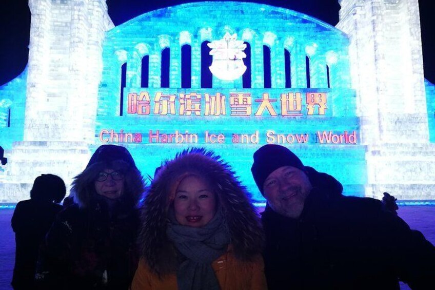 Harbin ice and snow world, the English speaking tour guide will her clients from Australia