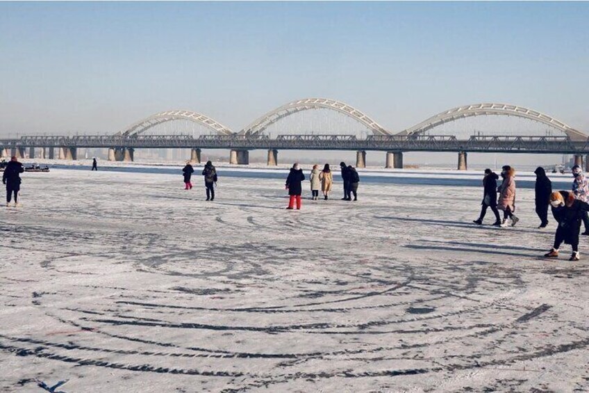 Frozen Songhua River and Railway Bridge