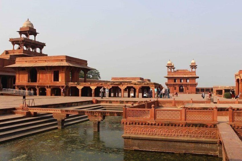 Abhaneri Step Well & Fatehpur Sikri Tour with Agra To Jaipur Drop- All Inclusive