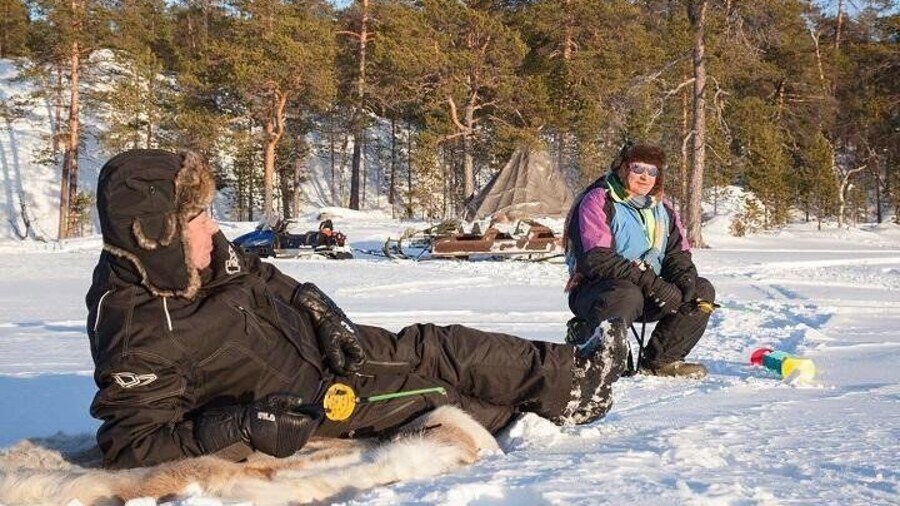 Ice Fishing in Lake Inari