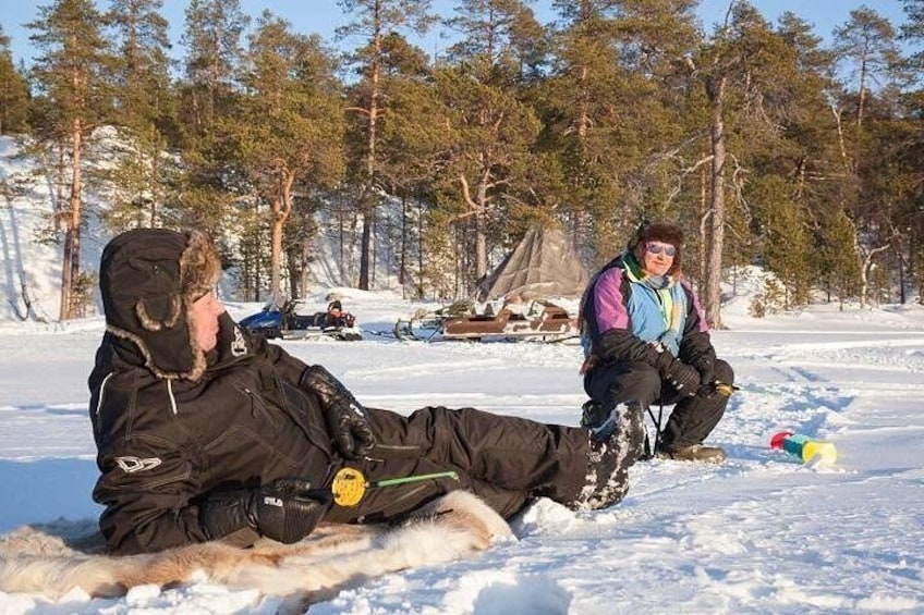 Ice Fishing in Lake Inari