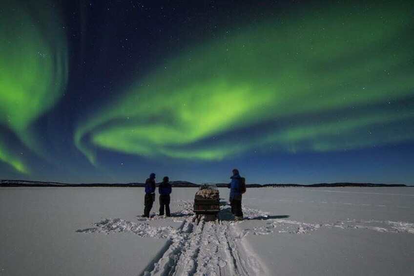 Northern Lights Hunt to Lake Inari from Kakslauttanen with Dinner over Campfire