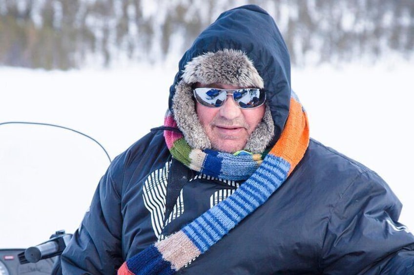 Ice Fishing Safari to Lake Inari from Kakslauttanen with Lunch over Campfire